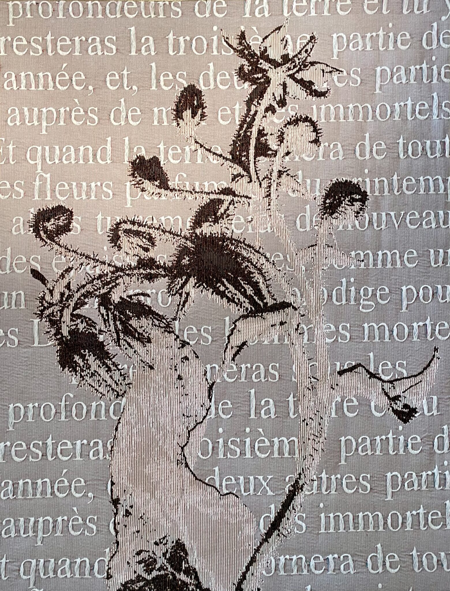 au dos de cette tapisserie, le créateur a fait tisser une extrait des 